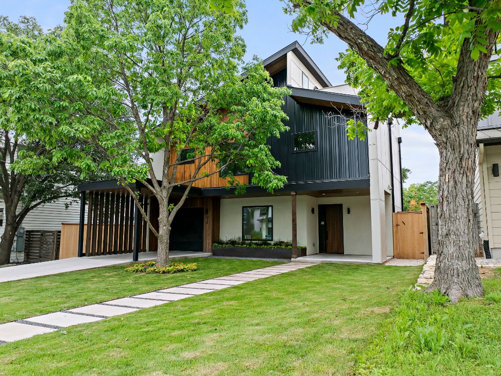 1805 Frazier Avenue Austin, TX 78704 - Photo 3 of 35 a front view of a house with garden