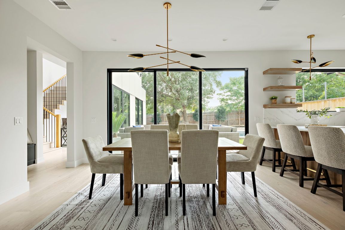 1805 Frazier Avenue Austin, TX 78704 - Photo 8 of 35 a view of a dining room with furniture window and wooden floor