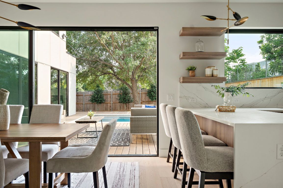1805 Frazier Avenue Austin, TX 78704 - Photo 10 of 35 a dining room with furniture and a large window