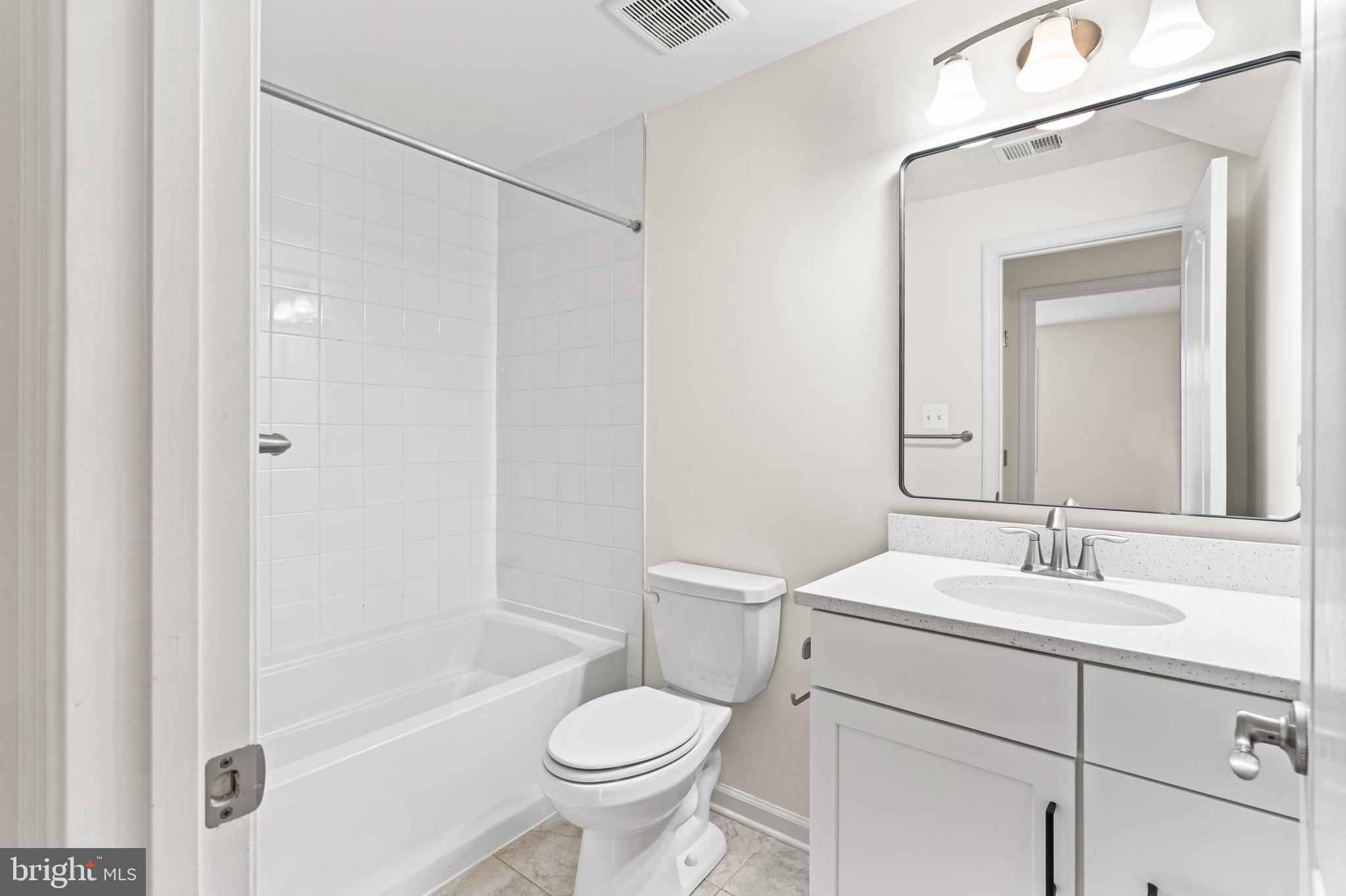 2395 Terrapin Crossing Jessup, MD 20794 - Photo 7 of 11 a bathroom with a sink toilet and shower