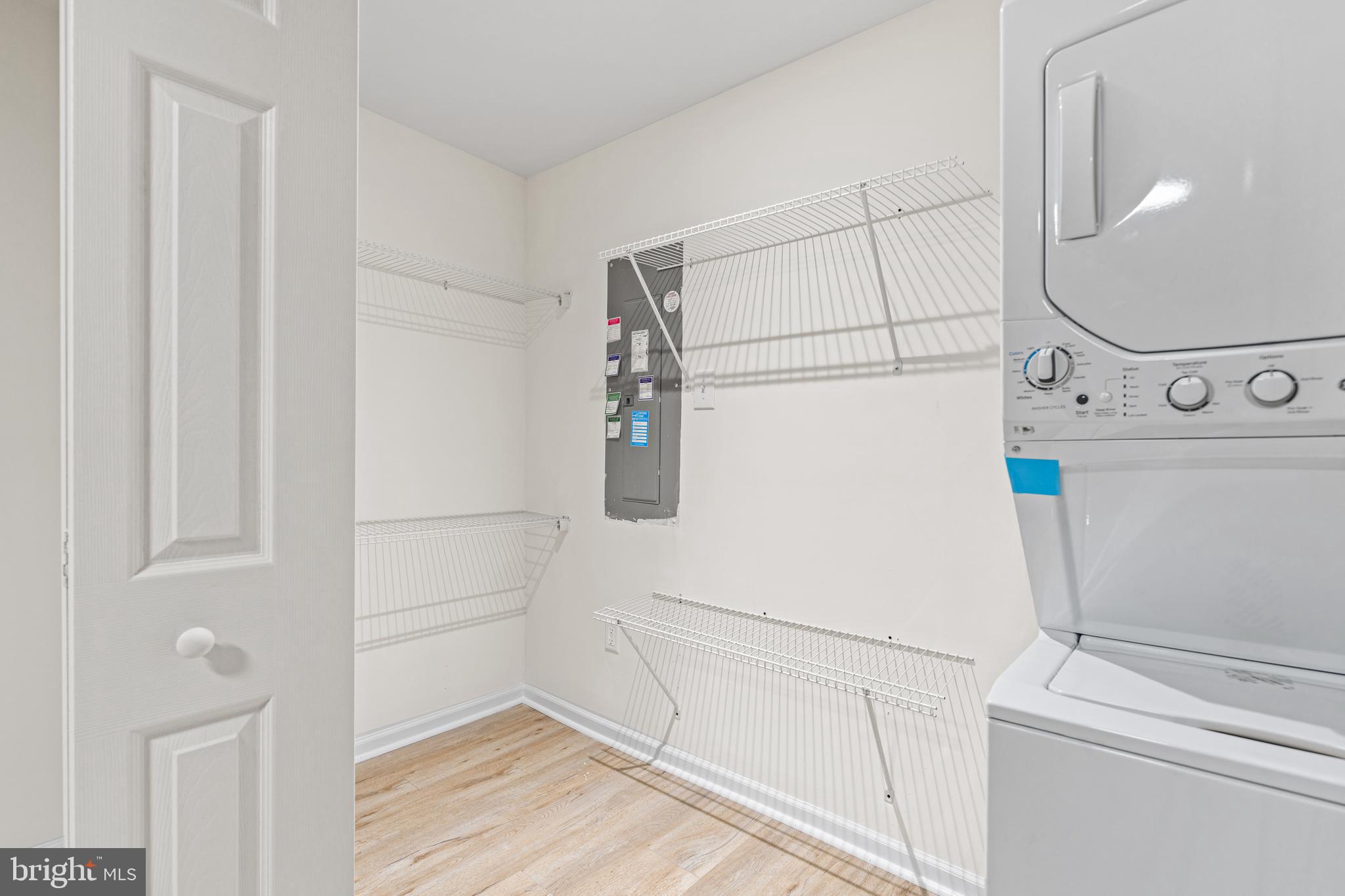 2395 Terrapin Crossing Jessup, MD 20794 - Photo 10 of 11 a view of storage and utility room with washer and dryer