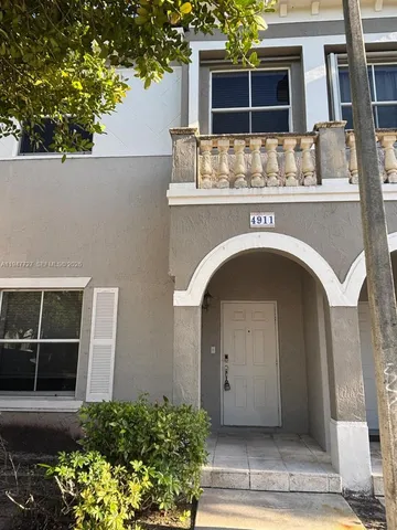 a front view of a house with windows