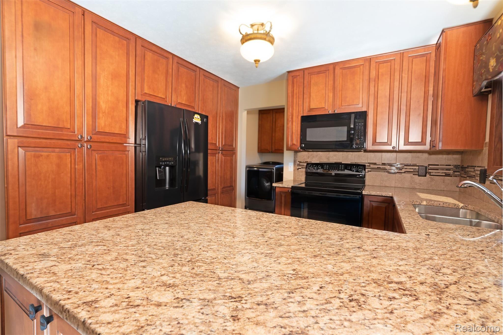 5033 Bradley Road Gregory, MI 48137 - Photo 15 of 31 Stunning and Spacious Granite Counters