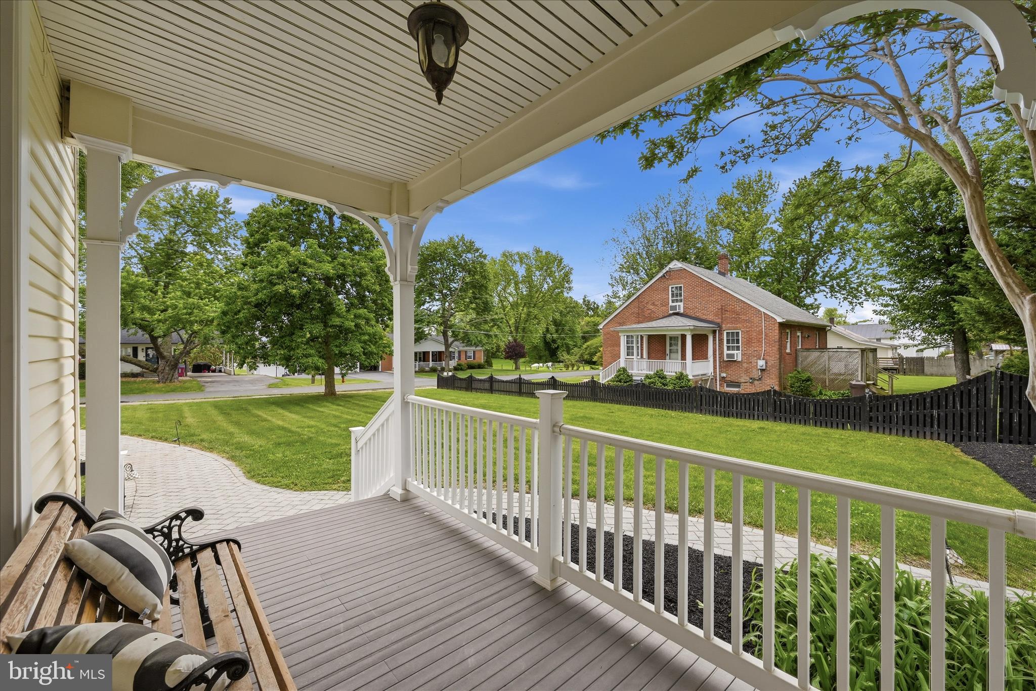 7919 Church Street Middletown, VA 22645 - Photo 4 of 48 a view of a wooden deck with a big yard
