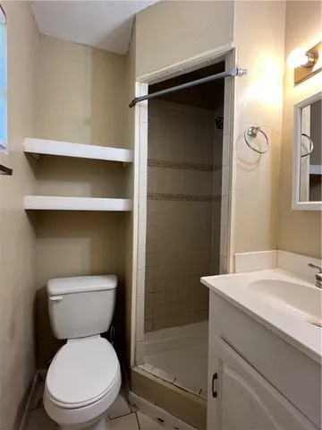 a bathroom with a toilet and a sink