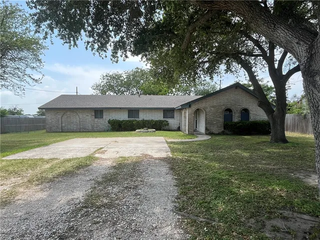 a house view with a garden space