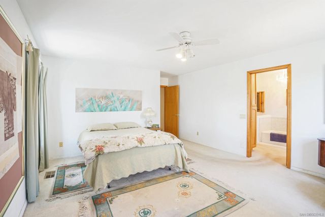 a room with a bed and a window