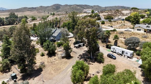 an aerial view of residential house with parking space