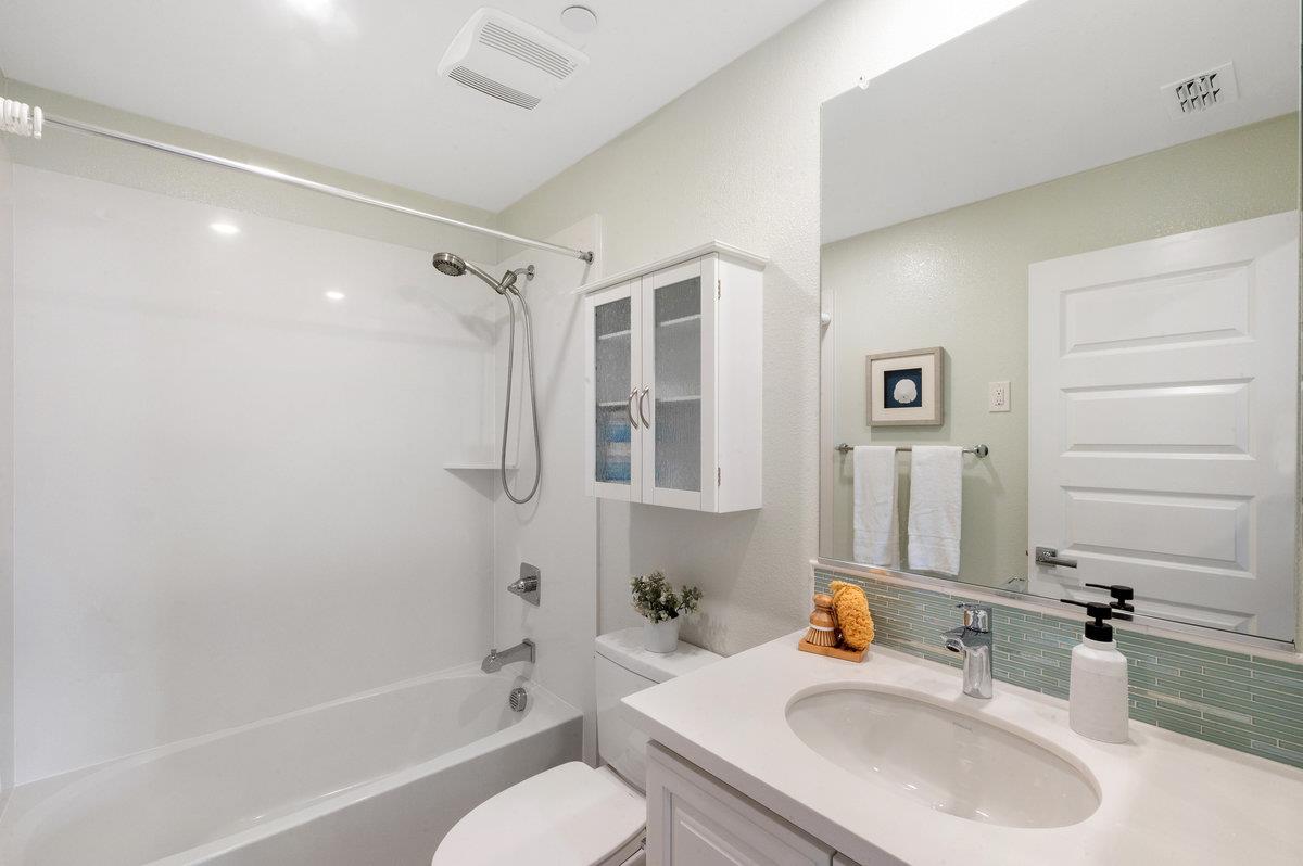 133 Stevenson Boulevard Fremont, CA 94539 - Photo 20 of 36 a bathroom with a sink toilet and shower