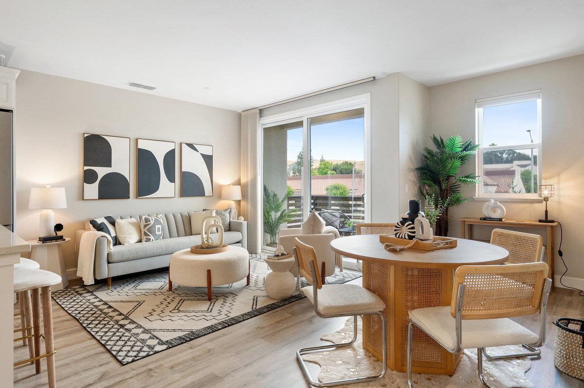 133 Stevenson Boulevard Fremont, CA 94539 - Photo 3 of 36 a living room with furniture and wooden floor