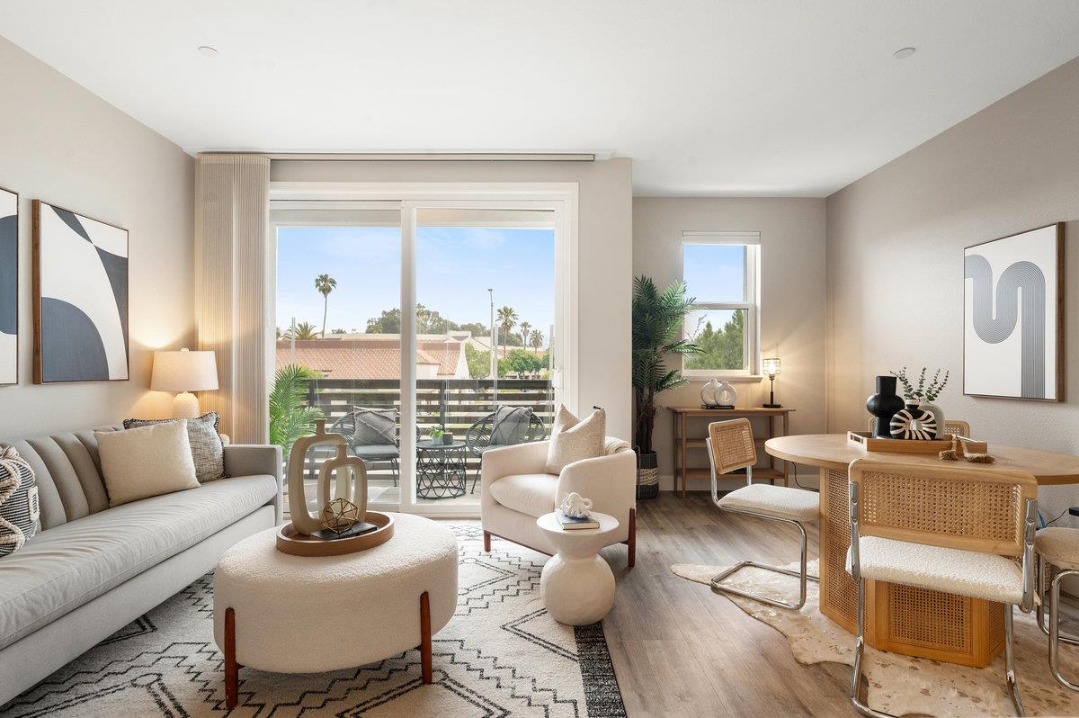 133 Stevenson Boulevard Fremont, CA 94539 - Photo 4 of 36 a living room with furniture and wooden floor