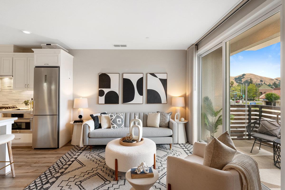 133 Stevenson Boulevard Fremont, CA 94539 - Photo 5 of 36 a living room with furniture and a large window
