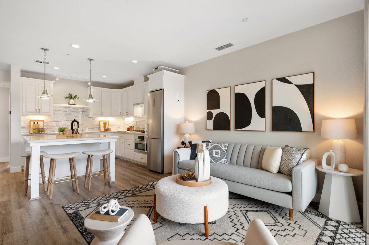 133 Stevenson Boulevard Fremont, CA 94539 - Photo 6 of 36 a living room with furniture and kitchen view