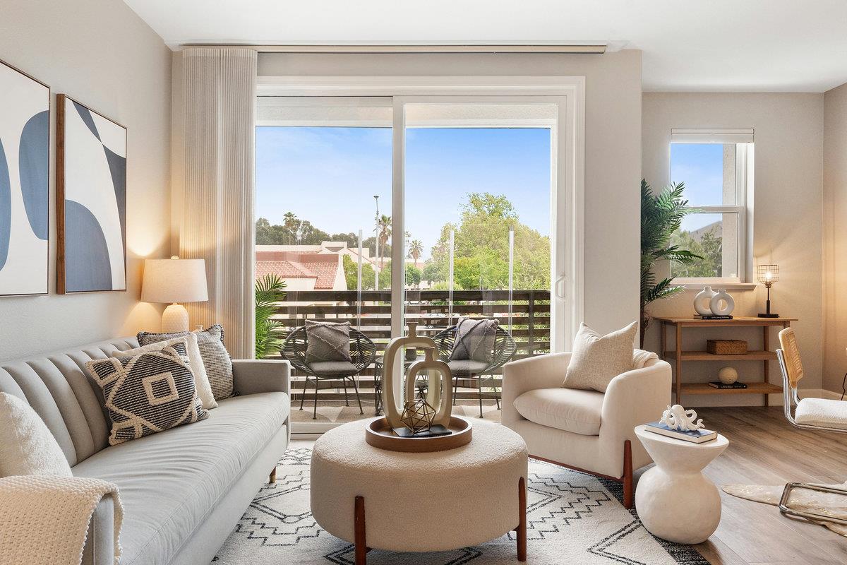 133 Stevenson Boulevard Fremont, CA 94539 - Photo 7 of 36 a living room with furniture and a large window