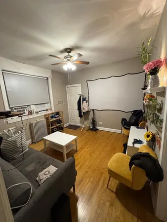 a room with furniture and a flat screen tv