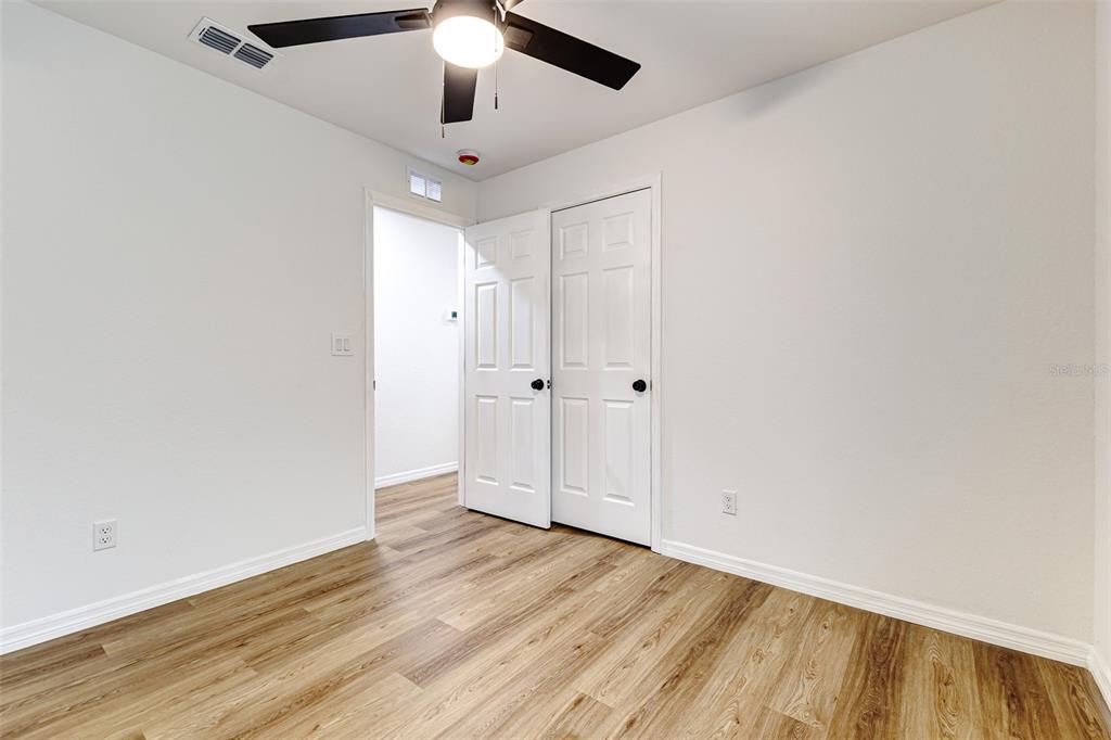 2728 Golfview Street Lakeland, FL 33801 - Photo 18 of 25 wooden floor in an empty room
