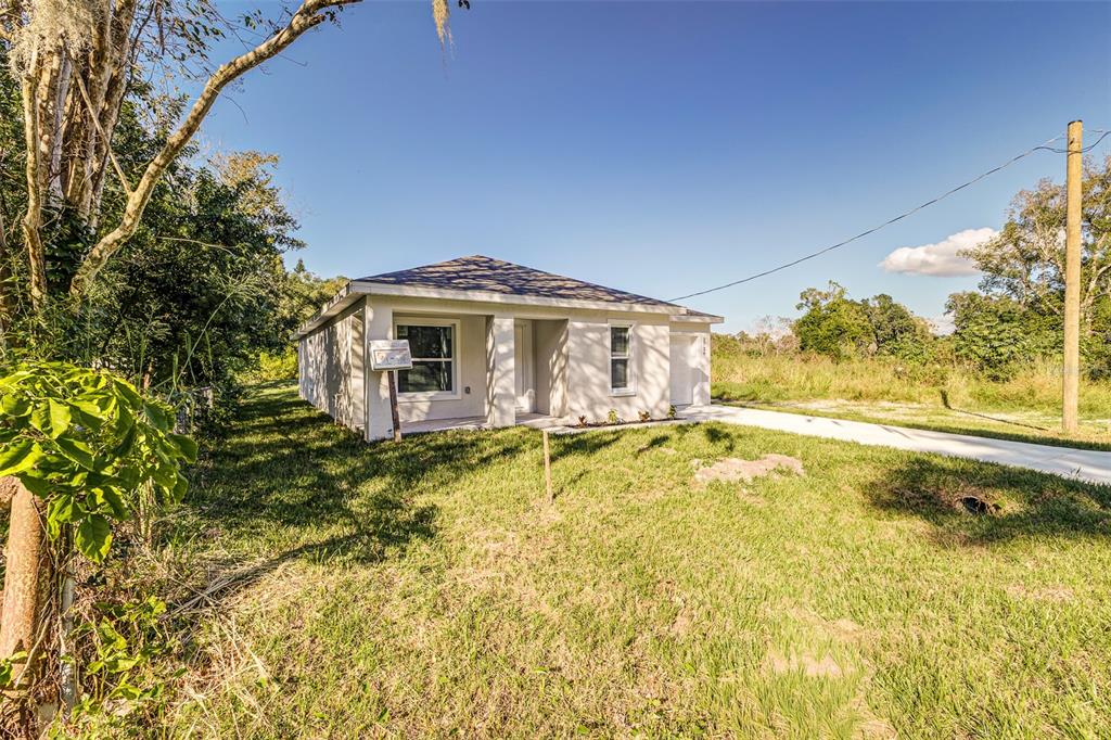 2728 Golfview Street Lakeland, FL 33801 - Photo 3 of 25 a view of a house with a swimming pool
