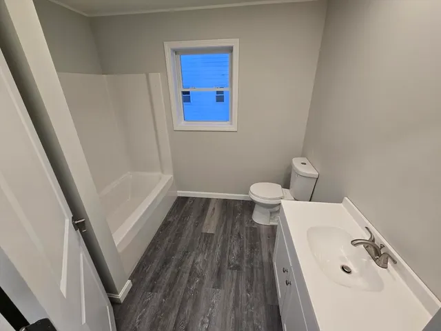 a bathroom with a sink and a toilet