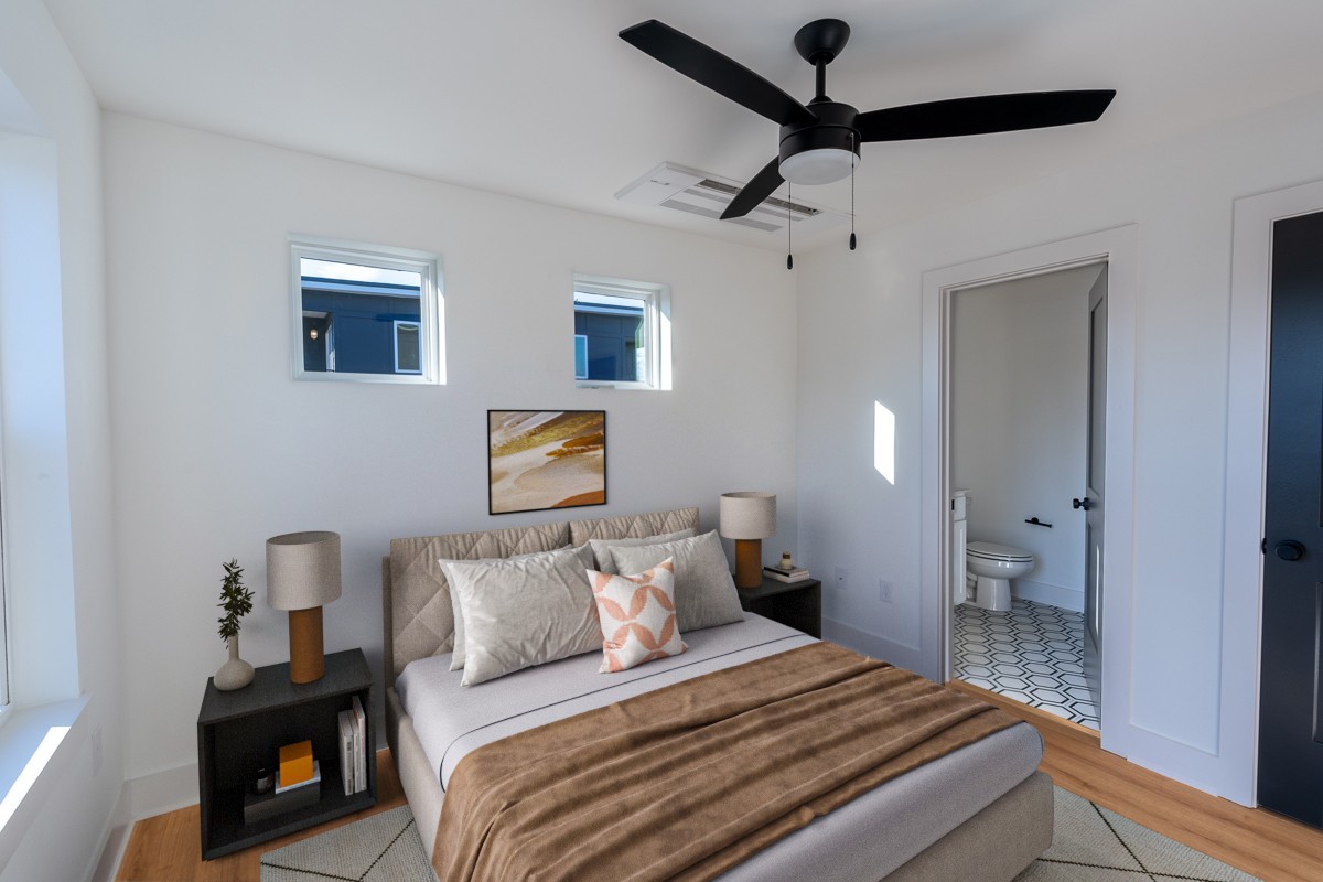 102 Duke Street, Unit 8 Nashville, TN 37207 - Photo 12 of 29 a bedroom with a bed and a lamp on the dresser
