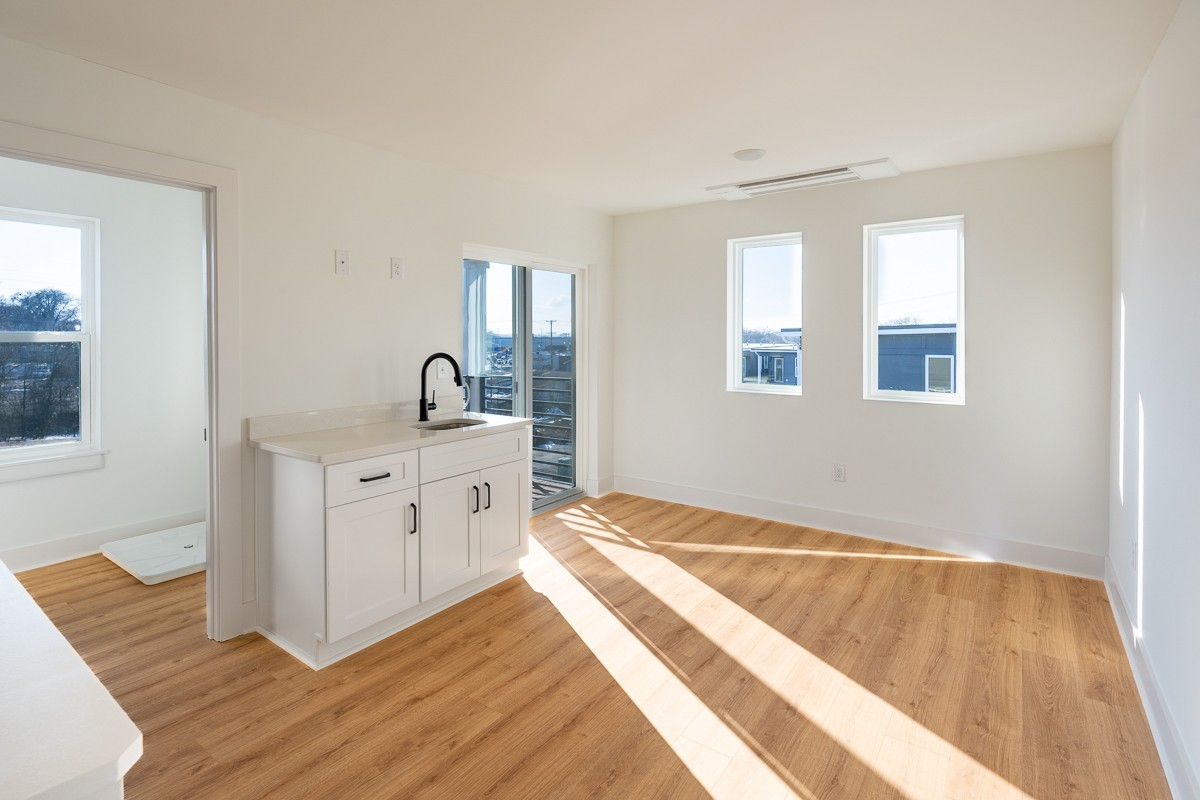 102 Duke Street, Unit 8 Nashville, TN 37207 - Photo 19 of 29 a bedroom with a bed and a window