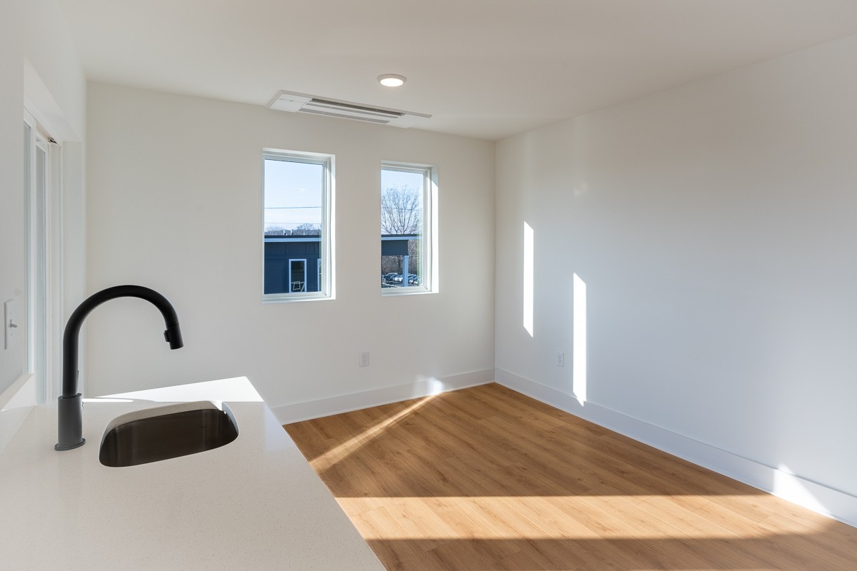 102 Duke Street, Unit 8 Nashville, TN 37207 - Photo 23 of 29 a bedroom with a bed and a dresser