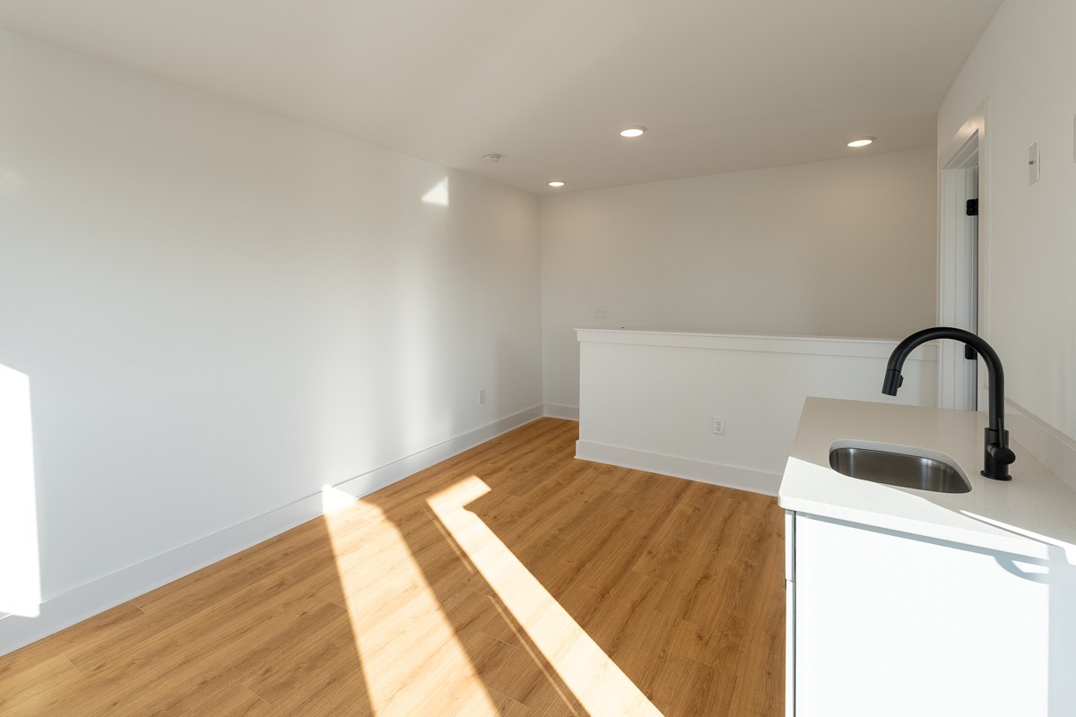 102 Duke Street, Unit 8 Nashville, TN 37207 - Photo 25 of 29 a bedroom with a bed and a sink