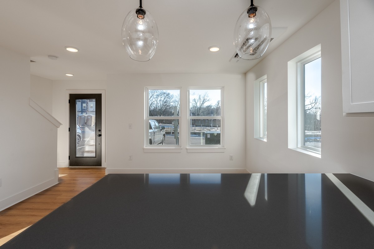 102 Duke Street, Unit 8 Nashville, TN 37207 - Photo 8 of 29 a view of an empty room with a window