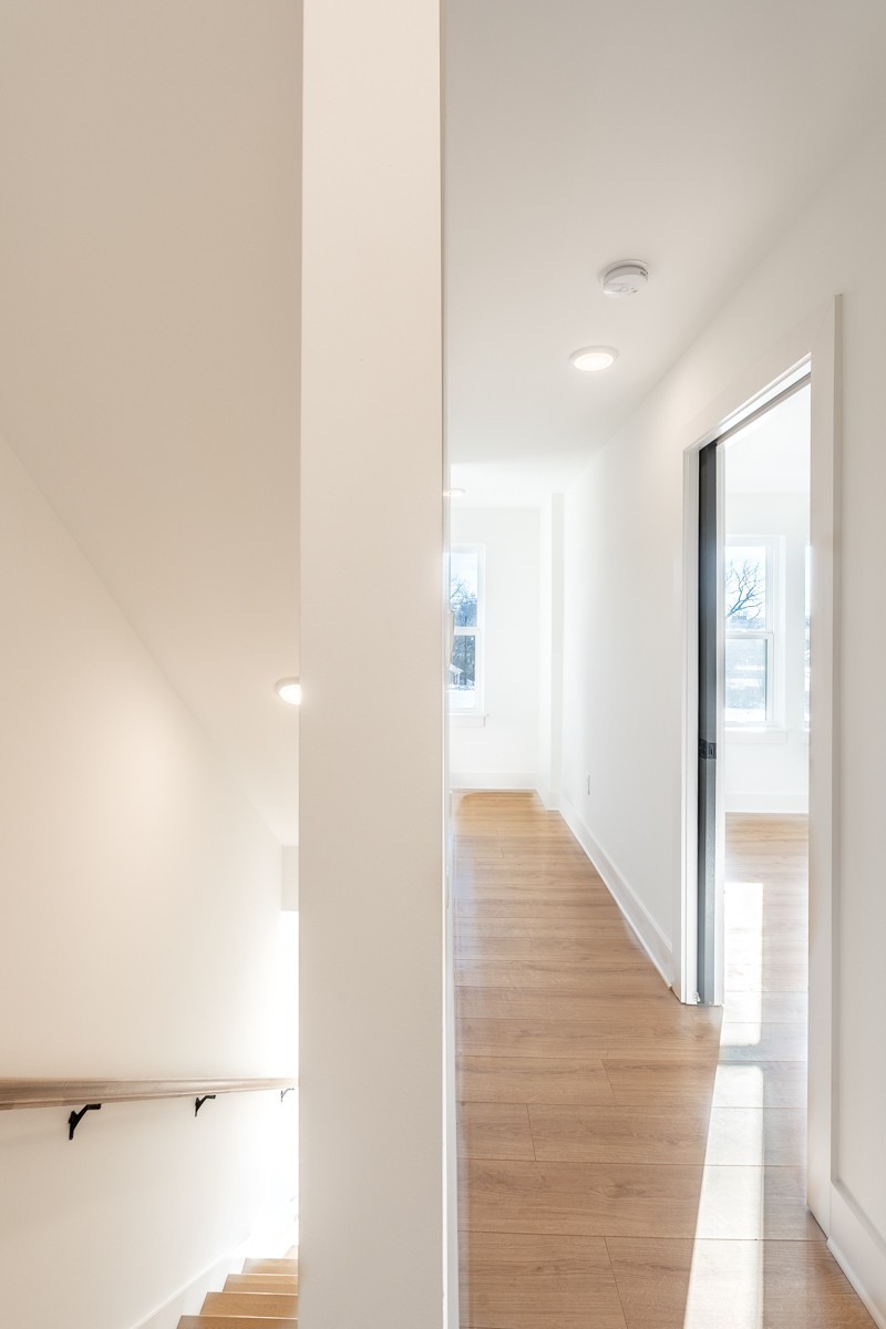 102 Duke Street, Unit 8 Nashville, TN 37207 - Photo 10 of 29 a view of a hallway with wooden floor