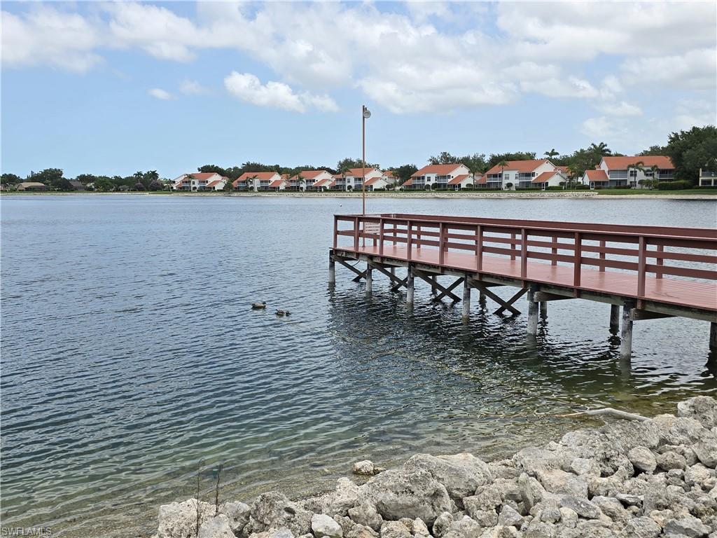 605 Squire Circle, Unit 203 Naples, FL 34104 - Photo 32 of 36 a view of a terrace with chairs