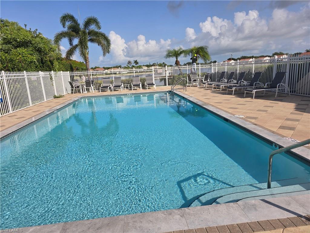 605 Squire Circle, Unit 203 Naples, FL 34104 - Photo 36 of 36 a view of a balcony with a ocean view
