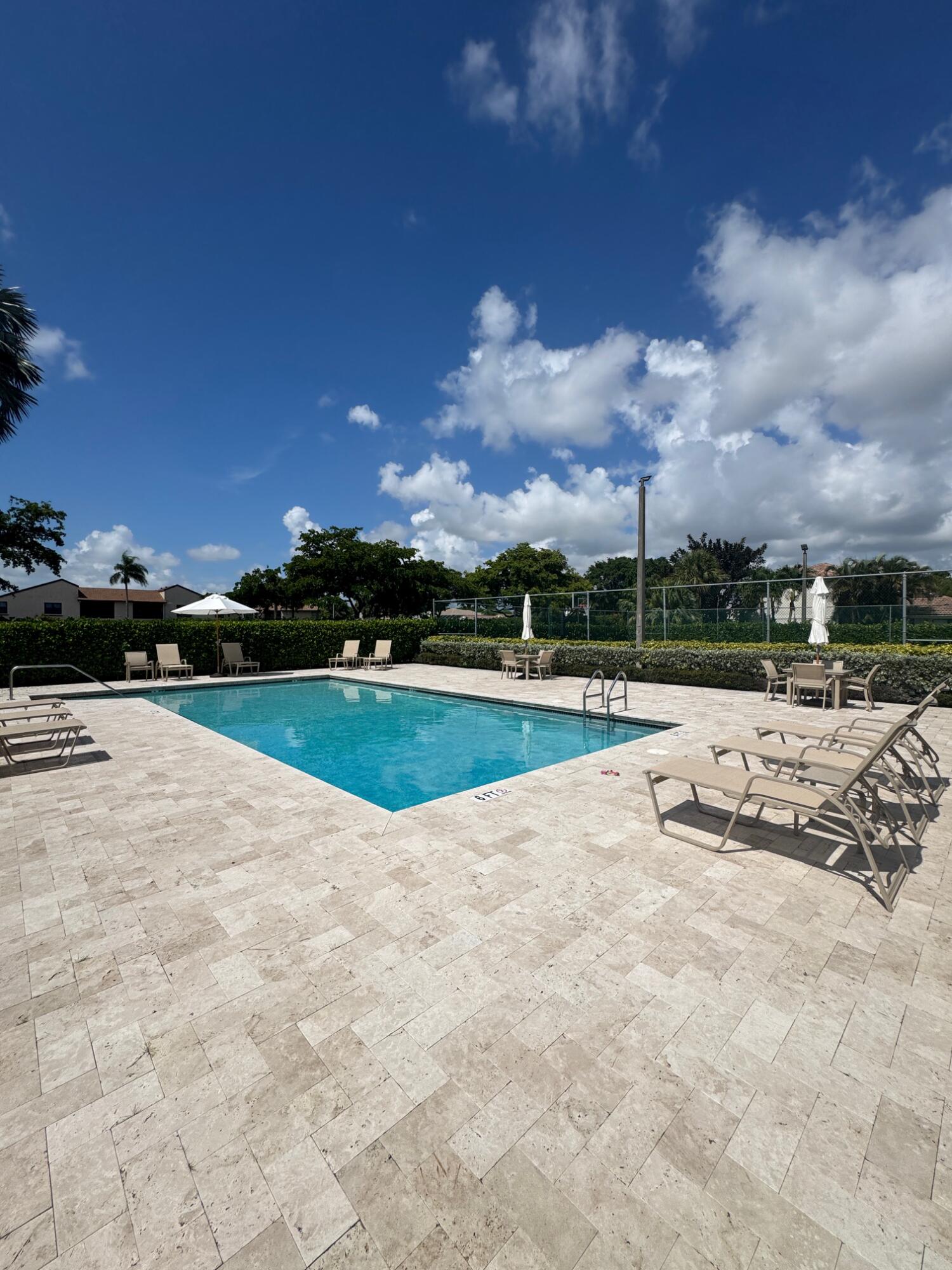 8711 Eagle Run Drive Boca Raton, FL 33434 - Photo 15 of 17 a view of outdoor space with garden and entertaining space