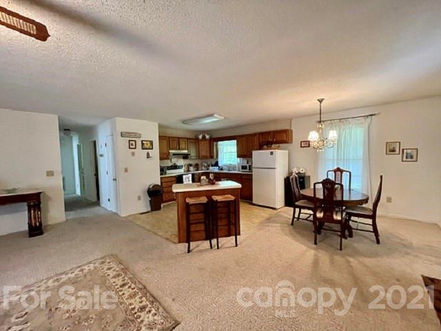 224 Lynch Street Rutherfordton, NC 28139 - Photo 6 of 23 a view of a dining room with furniture