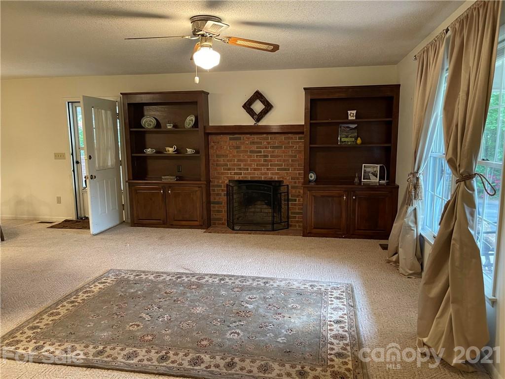 224 Lynch Street Rutherfordton, NC 28139 - Photo 9 of 23 a view of an empty room with a fireplace