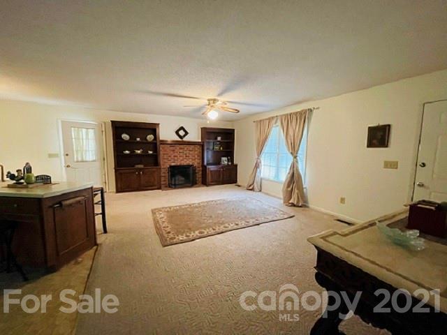 224 Lynch Street Rutherfordton, NC 28139 - Photo 10 of 23 a bedroom with a bed and a dresser