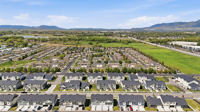 1173 West 1870 South Logan, UT 84321 - Photo 31 of 33 Expansive aerial perspective showcasing a residential community with diverse housing styles and mountain backdrops