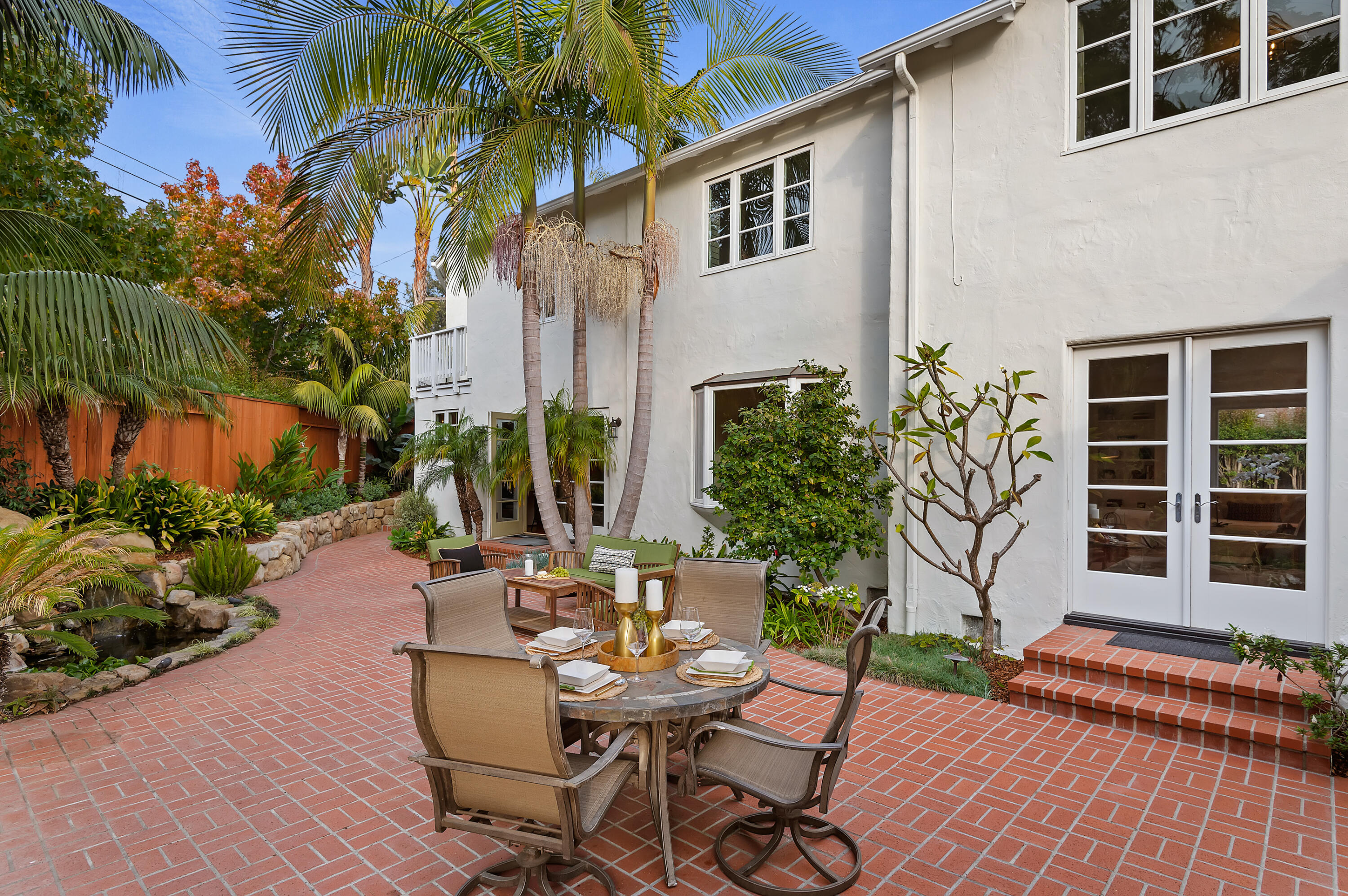 189 Hermosillo Road Montecito, CA 93108 - Photo 35 of 47 a view of a white house with a patio