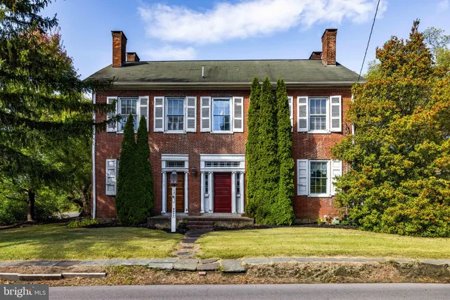a view of a house with a swimming pool