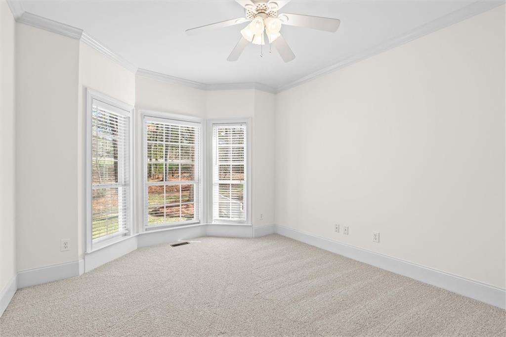 1030 Lakeview Parkway Villa Rica, GA 30180 - Photo 19 of 46 an empty room with windows and entrance