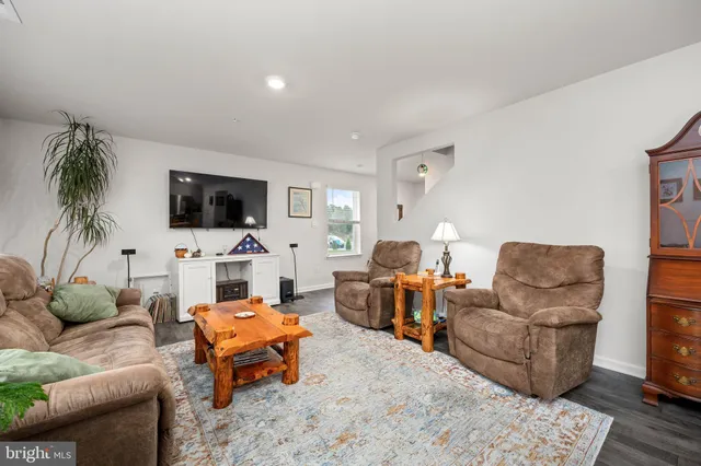 a bedroom with a bed and a table