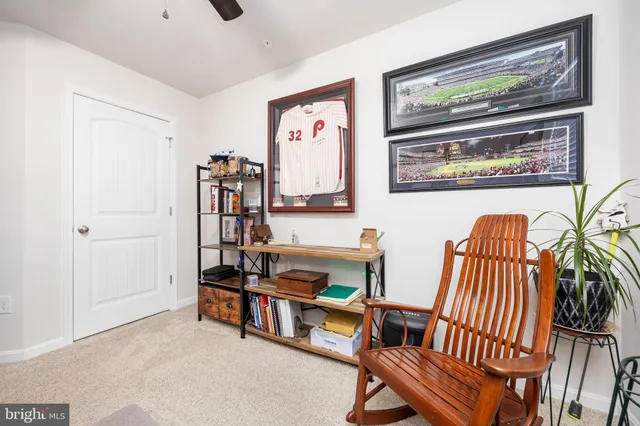 a en suite bathroom with a sink and mirror