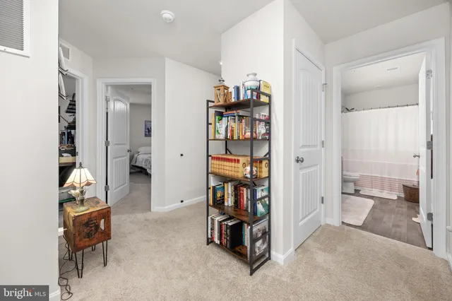 a view of a swimming pool with outdoor seating