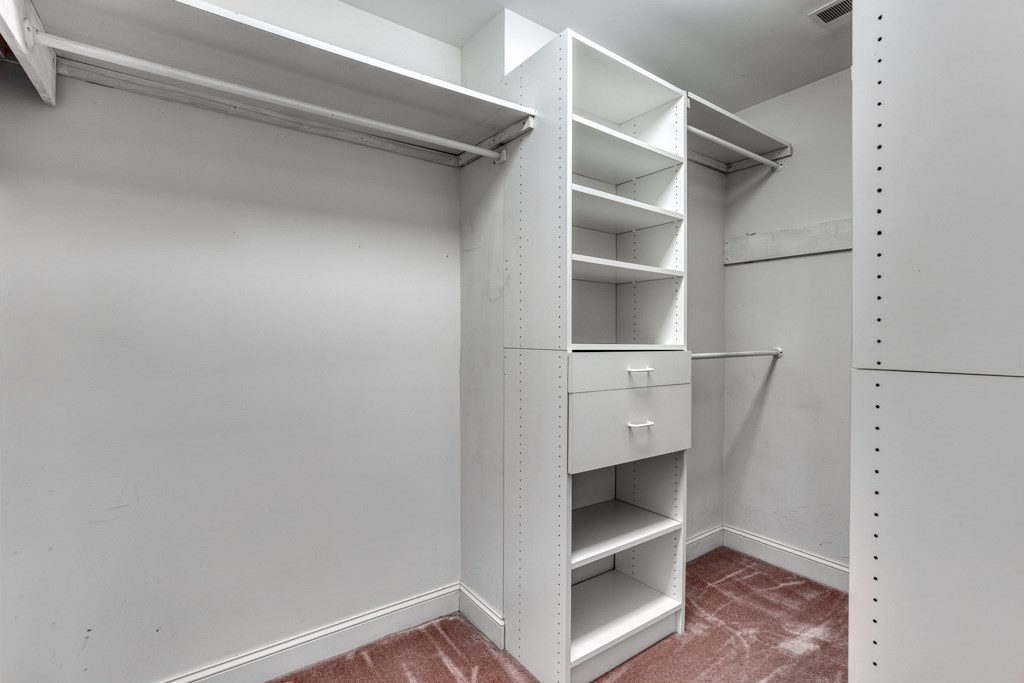 51 Glendale Road Boxford, MA 01921 - Photo 23 of 37 a view of an empty walk in closet