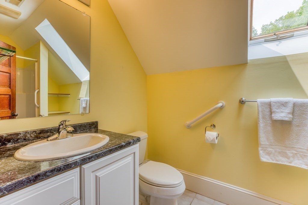 51 Glendale Road Boxford, MA 01921 - Photo 28 of 37 a bathroom with a granite countertop sink and a mirror