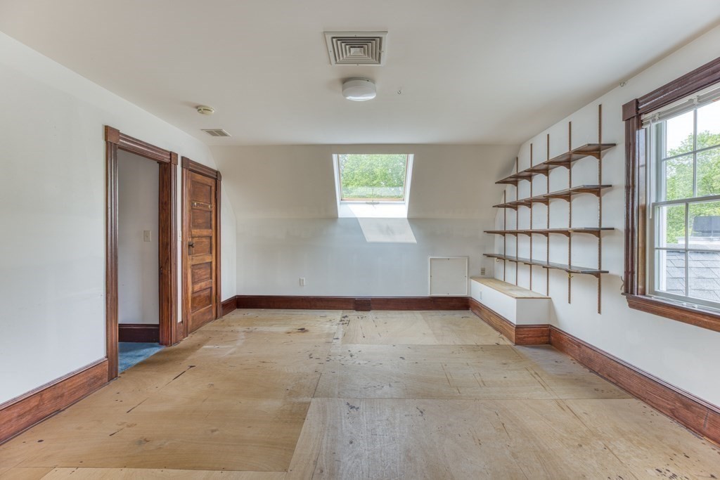 51 Glendale Road Boxford, MA 01921 - Photo 32 of 37 an empty room with windows