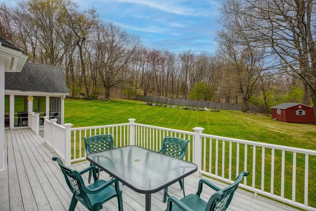 51 Glendale Road Boxford, MA 01921 - Photo 34 of 37 a view of a deck with furniture