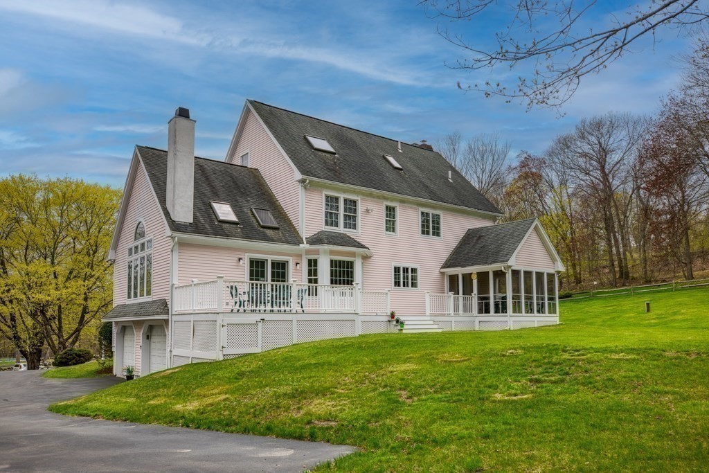 51 Glendale Road Boxford, MA 01921 - Photo 36 of 37 a front view of a house with garden