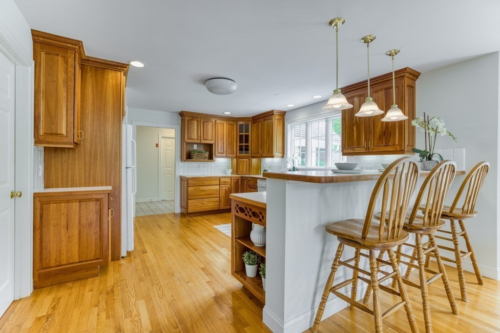 51 Glendale Road Boxford, MA 01921 - Photo 10 of 37 a kitchen view with cabinets and a refrigerator