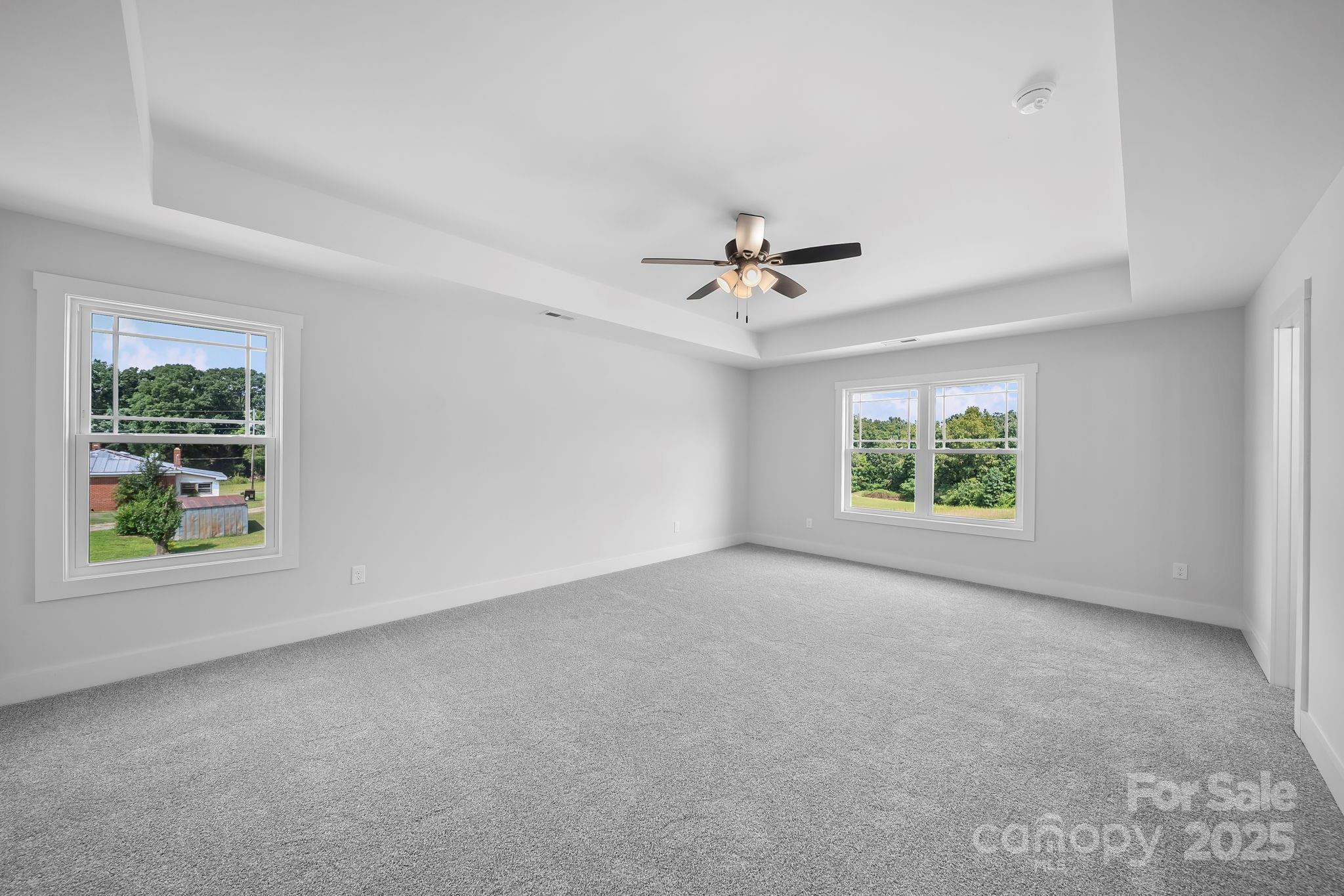 1312 Austin Chaney Road Wingate, NC 28174 - Photo 19 of 47 an empty room with windows