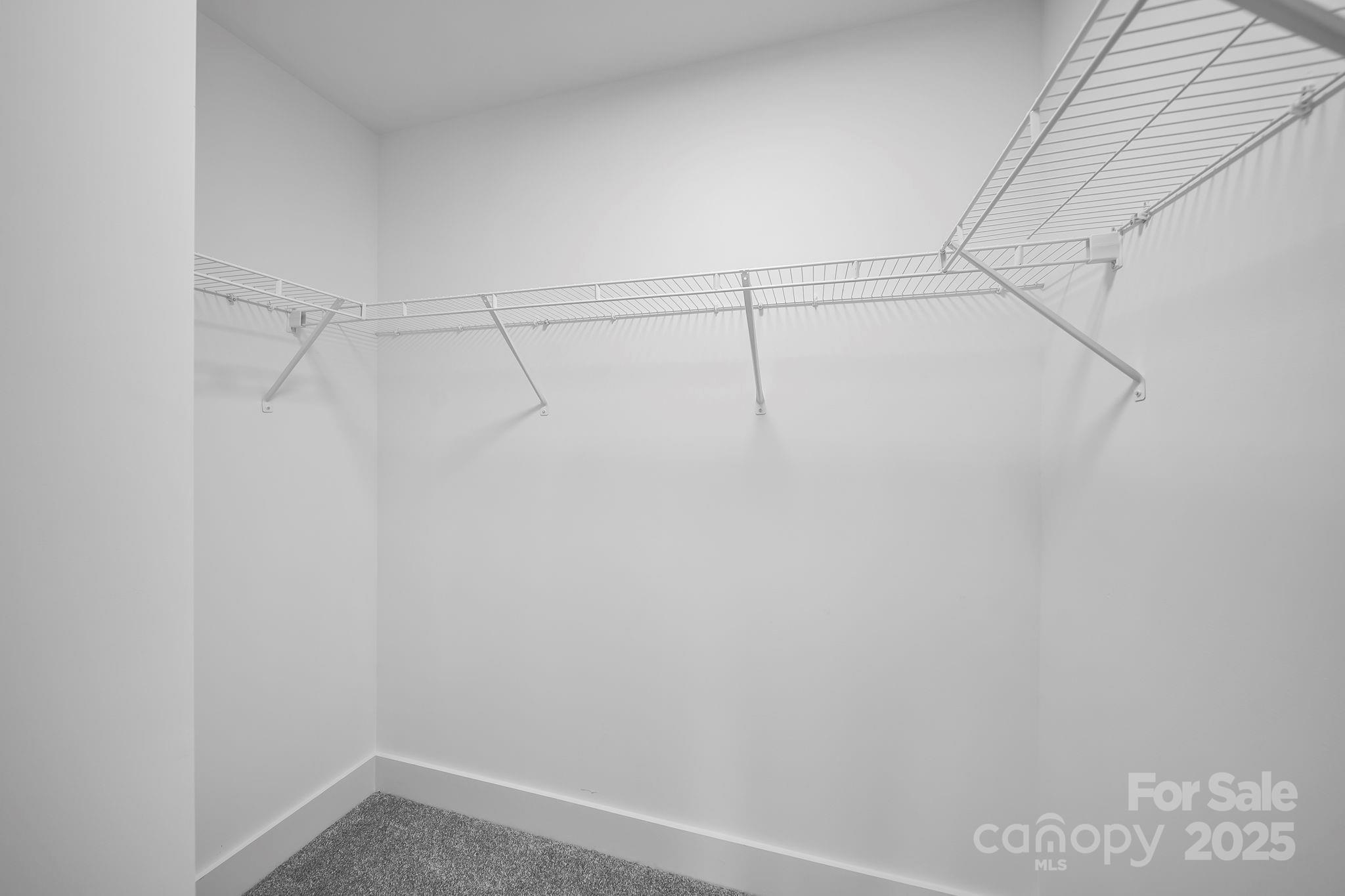 1312 Austin Chaney Road Wingate, NC 28174 - Photo 24 of 47 a view of a room with racks on the wall