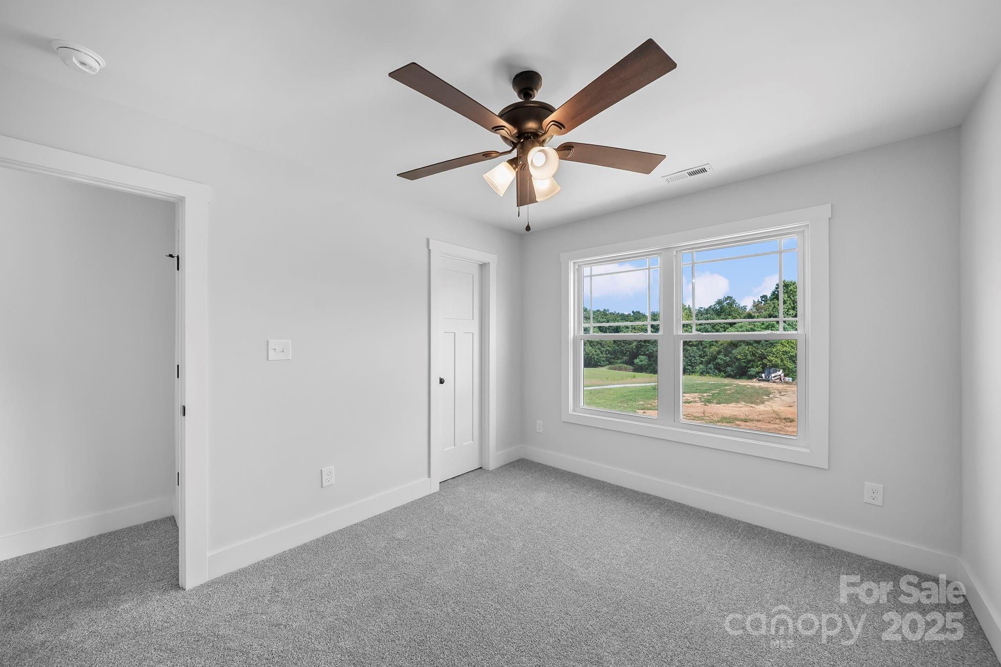 1312 Austin Chaney Road Wingate, NC 28174 - Photo 26 of 47 a view of an empty room with a window